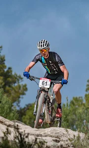 Vincent Coste MTB rider over the rocks in MTB XCO championship — Stock Photo, Image