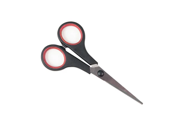 Küçük metal dikiş makas yol kaydedilmiş bir beyaz arka plan üzerinde izole kapalı