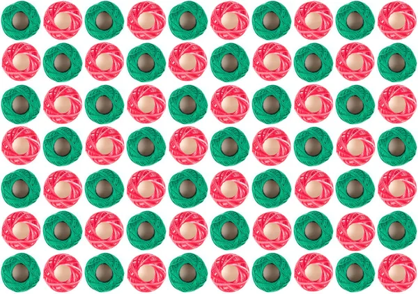 Kırmızı ve yeşil doku, desen. Duvar kağıdı olarak dikiş ipliği.