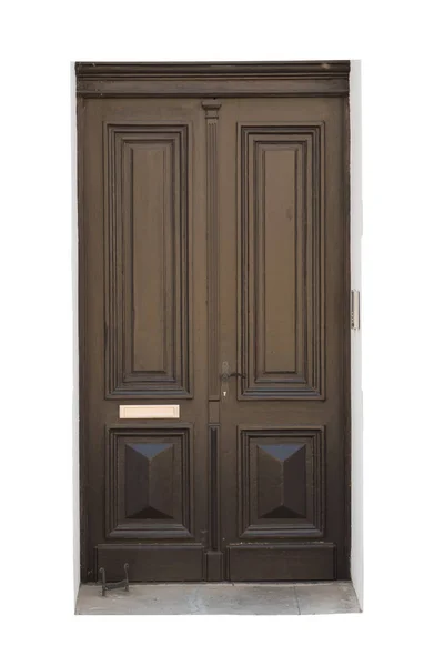Eski beyaz arka plan üzerinde yüzey izole kahverengi ahşap kapı oyma. Ev veya bina dış cephe detay ve dekorasyon. Eski ve retro ahşap kapı