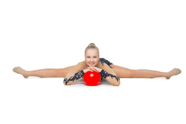 Beautiful gymnast girl with red ball — Stock Photo, Image