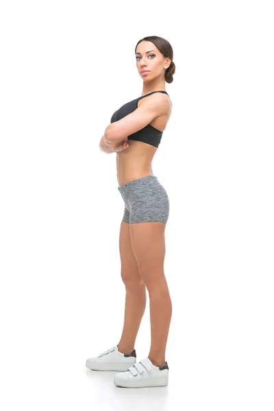 Bella ragazza in forma in reggiseno sportivo e pantaloncini — Foto Stock
