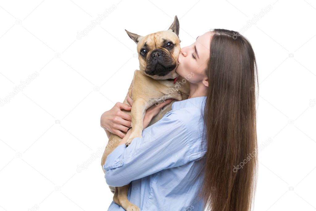 Beautiful girl holding french bulldog