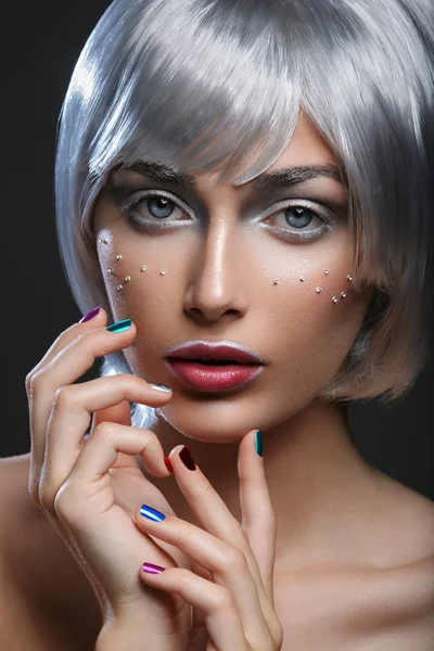 Beautiful girl in silver wig