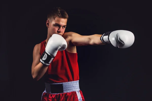 Young boxer sportsman in red sport suit — Stock Photo, Image