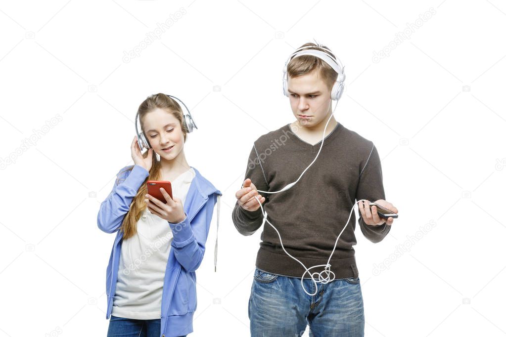 Teen boy and girl with headphones