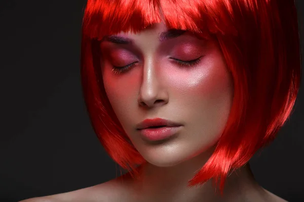 Beautiful girl in red wig — Stock Photo, Image