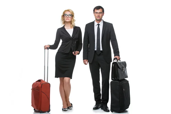 Businessman and business woman with travel cases — Stock Photo, Image