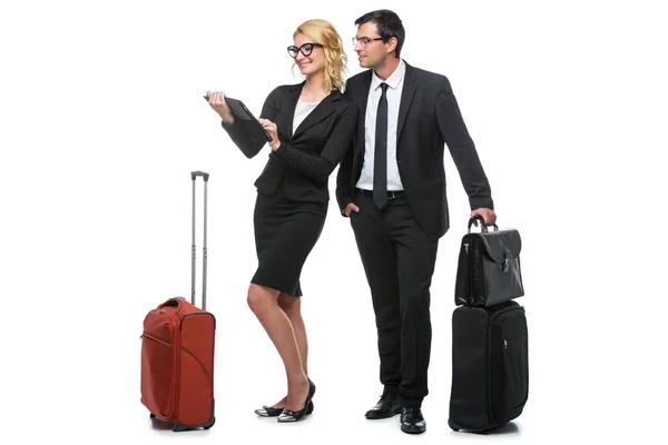 Businessman and business woman with travel cases — Stock Photo, Image