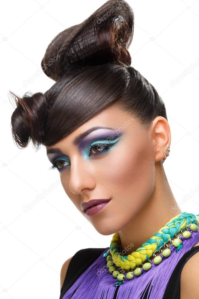Beautiful girl with bright vivid purple make-up