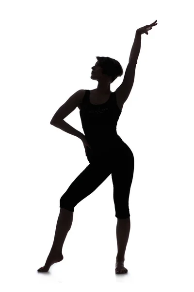 Танцующая женщина на белом фоне — стоковое фото