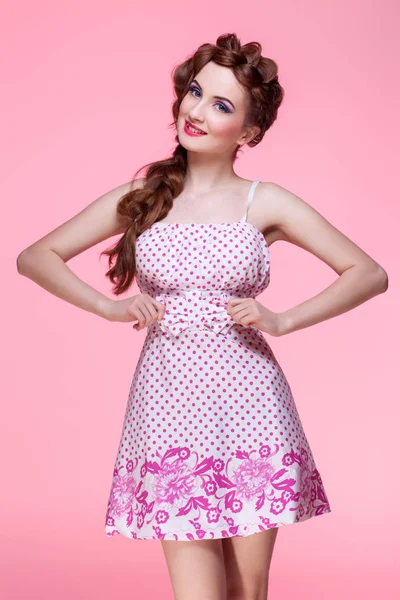 Beautiful girl in dress with braided hair — Stock Photo, Image