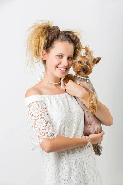 Girl in white dress with yorkie dog — Stock Photo, Image