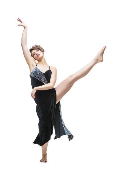 Female dancer posing with raised leg — Stock Photo, Image