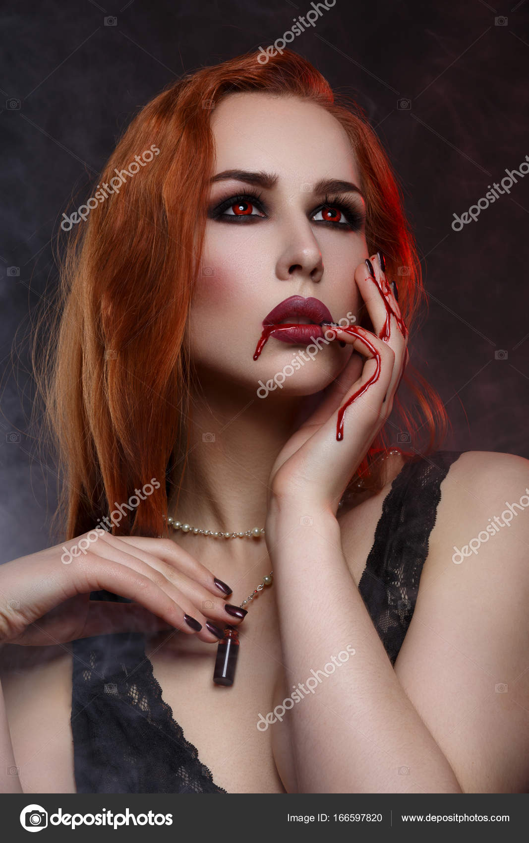 Young vampire woman Stock Photo by ©Svetography 166597820