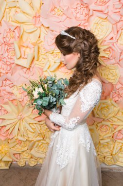 Bride girl holding bouquet