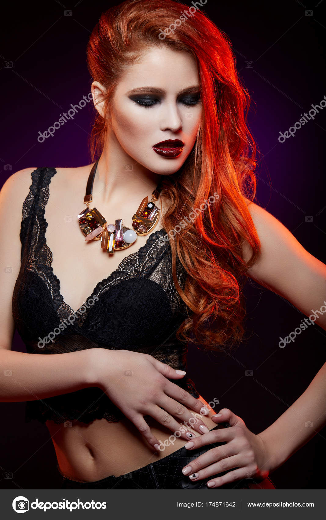 Beautiful girl with bright makeup and red hair Stock Photo by ©Svetography  174871642