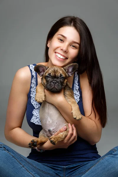 Girl with french bulldog puppy — Stock Photo, Image