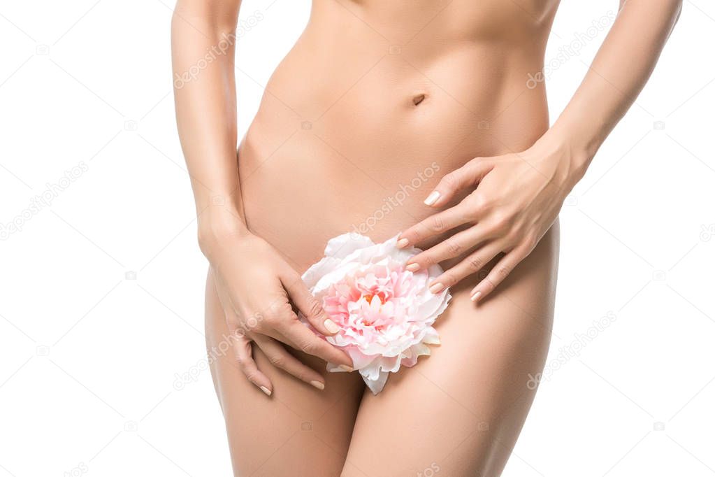beautiful woman naked body with flower between legs 