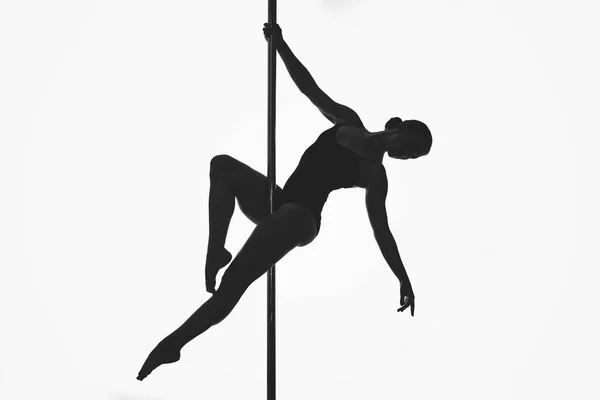 Beautiful pole dancer girl silhouette — Stock Photo, Image