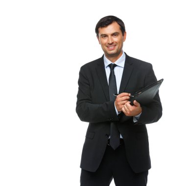 tablet ile takım elbiseli yakışıklı işadamı