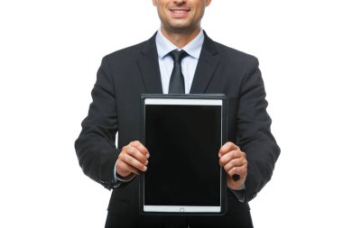 tablet ile takım elbiseli yakışıklı işadamı