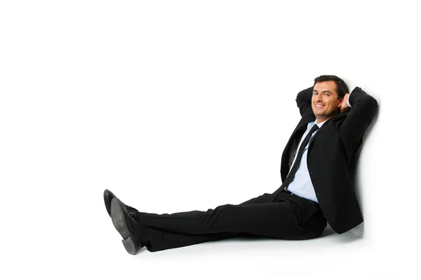 Bonito homem de negócios em terno descansando — Fotografia de Stock