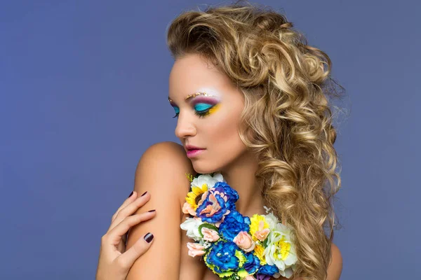 Beautiful girl with flower accessories — Stock Photo, Image