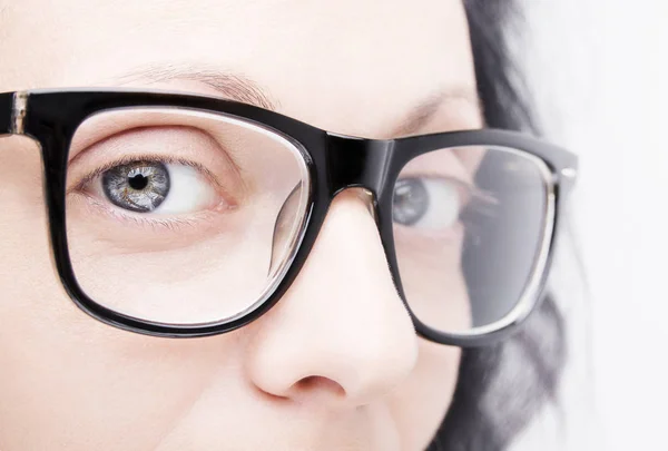 Beautiful young woman wearing glasses close-up isolated on white — Stock Photo, Image