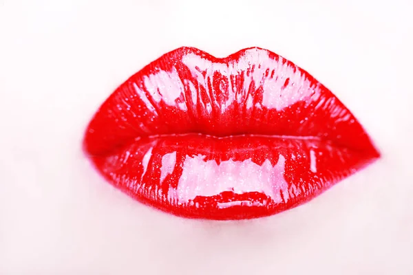 Close-up of woman's lips with bright fashion red glossy makeup. — Stock Photo, Image