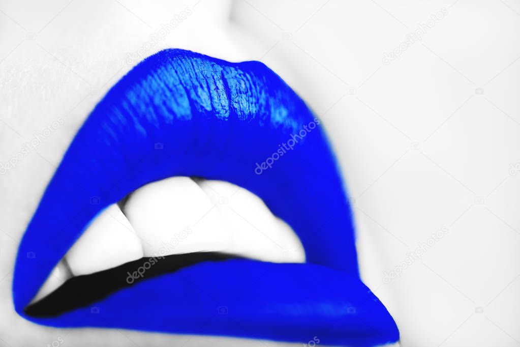 Close-up of sexy woman lips with blue lipstick
