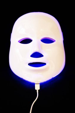 Light rejuvenating mask for facial skin therapy clipart