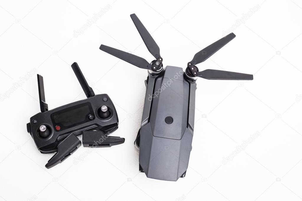 Uav drone and remote copter isolated on white background.