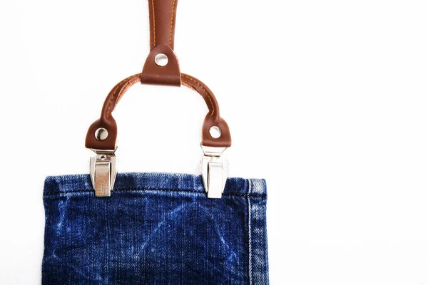 Detail van een witte bretels op vintage jeans — Stockfoto