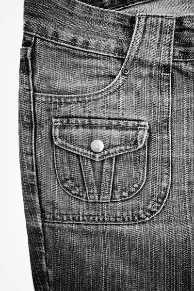 粗斜纹棉布牛仔裤背景与煤层的牛仔裤时尚设计. — 图库照片