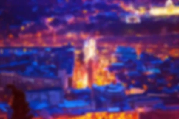 City lights bokeh oskärpa effekt på natten. Ofokuserat suddig urban abstrakt bakgrund. — Stockfoto