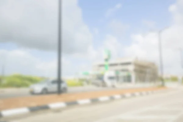 Abstrakter verschwommener Hintergrund. Verwischte Straße mit laufendem Auto — Stockfoto