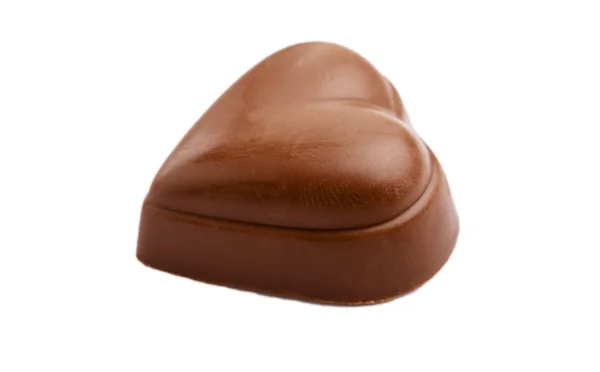 Coração em forma de chocolate doce isolado no fundo branco. — Fotografia de Stock