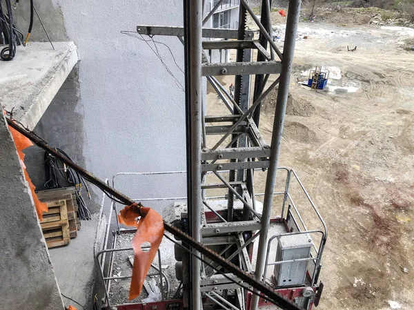 Elevator for material handling at construction site