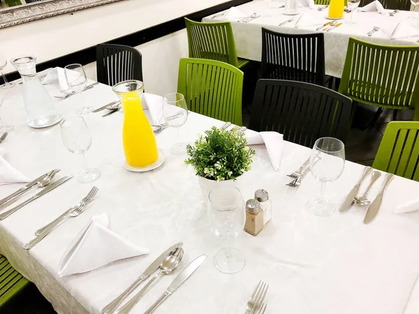 Beautifully organized event - served festive white tables ready for guests. Event in a restaurant. — Stock Photo, Image