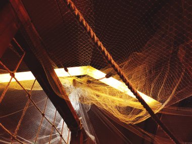 Deniz deniz tarzı konsepti için bir dekorasyon olarak arka plan, Balık tutmak için ekipmanlar ve eski mücadele ağları.