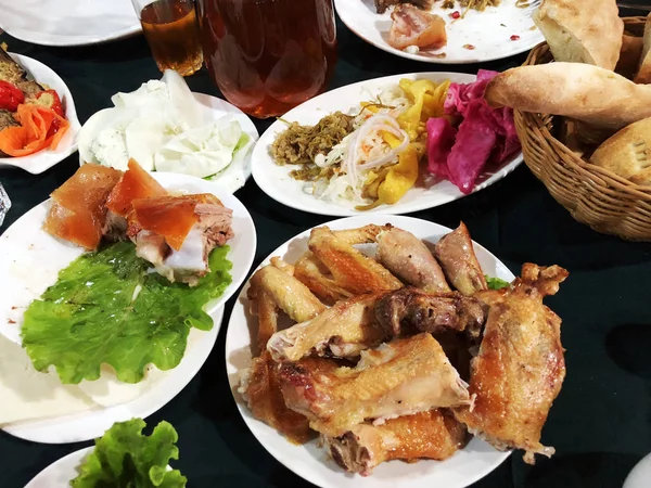 A lot of food on the wooden table. Georgian cuisine — Stock Photo, Image