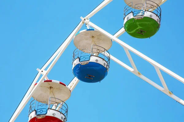 Colorful ferris wheel on blue sky background in Luna Park. — Stock Photo, Image