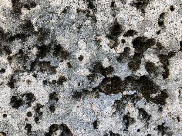 Κοντινό πλάνο του φυσικού πέτρινου τοίχου. Σύνθεση πέτρινου τοιχώματος — Φωτογραφία Αρχείου