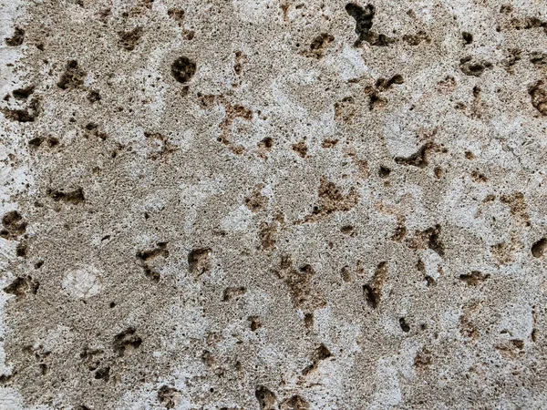 Κοντινό πλάνο του φυσικού πέτρινου τοίχου. Σύνθεση πέτρινου τοιχώματος — Φωτογραφία Αρχείου