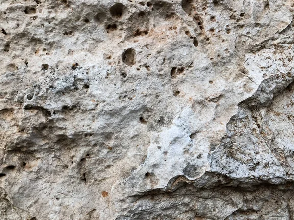 Doğal taş duvarı kapatın. Taş duvar dokusu 