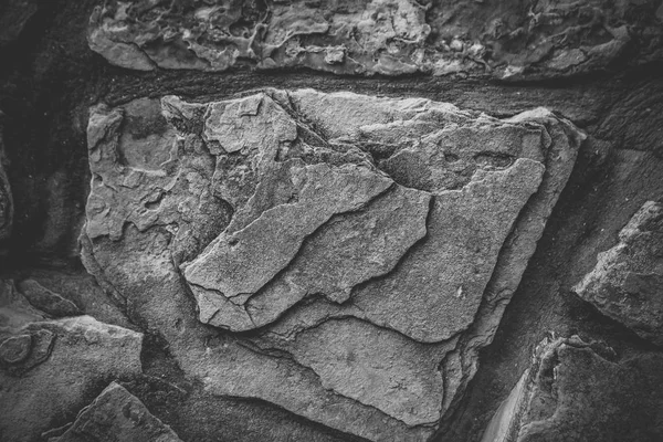 Primo piano del muro di pietra naturale. Struttura della parete di pietra — Foto Stock