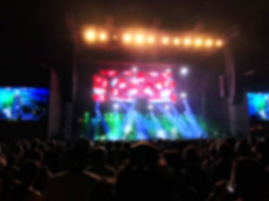 Bulanık arka plan. Seyirci ile konser bokeh aydınlatma.