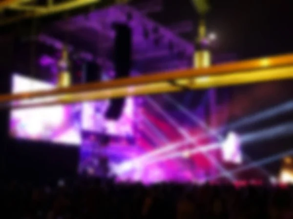 Blurred abstract background. Bokeh lighting in concert with audience. — Stock Photo, Image