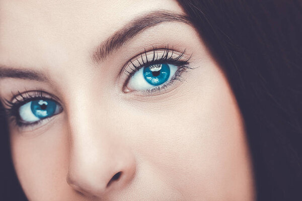 Beautiful insightful look blue woman's eyes.